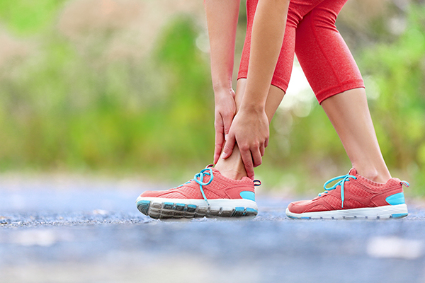 An image of a woman with a sports injury