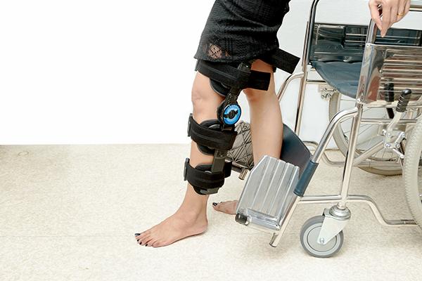 An image of a patient learning to walk again